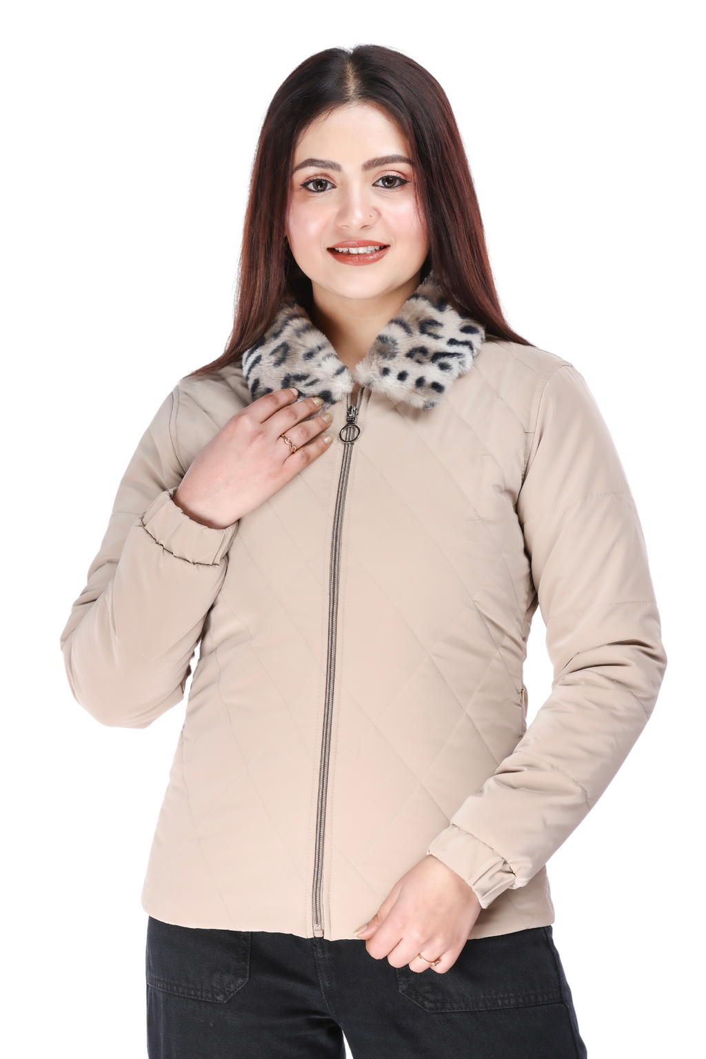 Close-up of a woman in a cream faux-fur PU jacket with a leopard-print collar, smiling directly at the camera while lightly holding the collar with one hand.