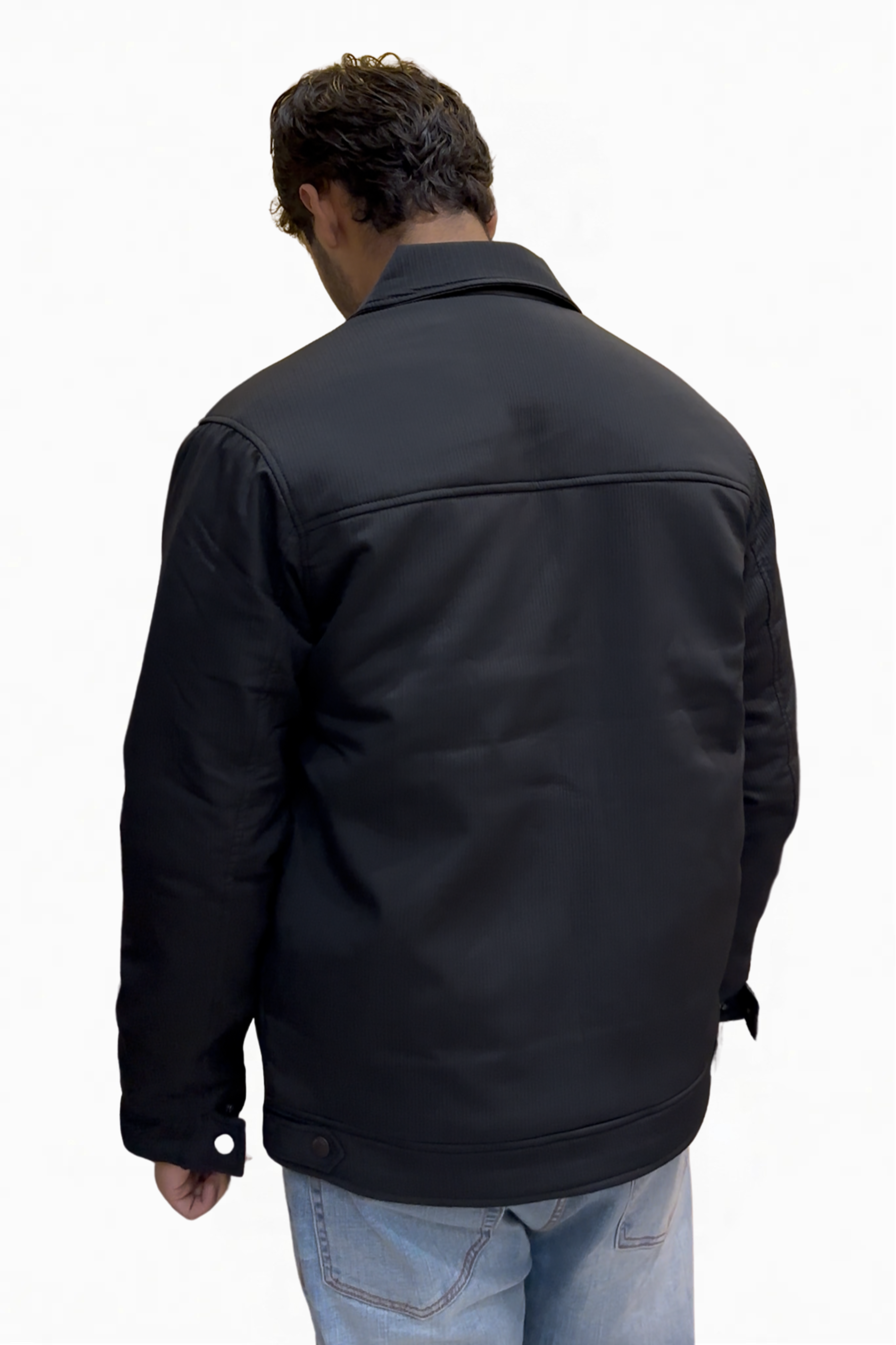 Person wearing a black jacket on a white background