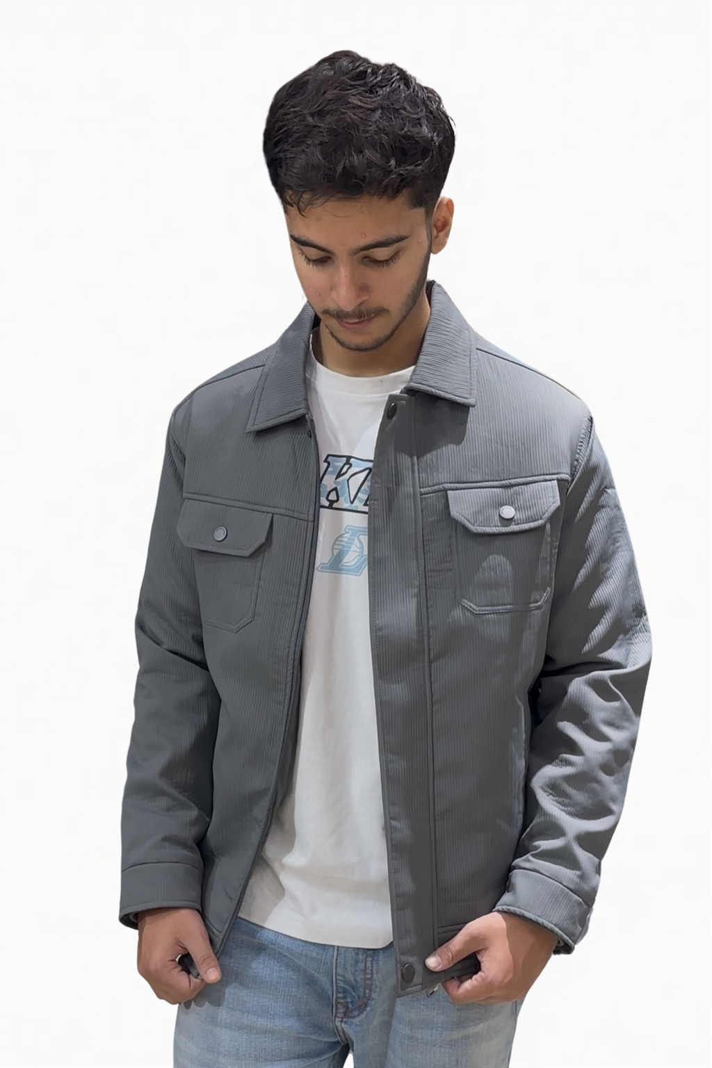 Man wearing a gray jacket over a white shirt with a graphic design on a white background