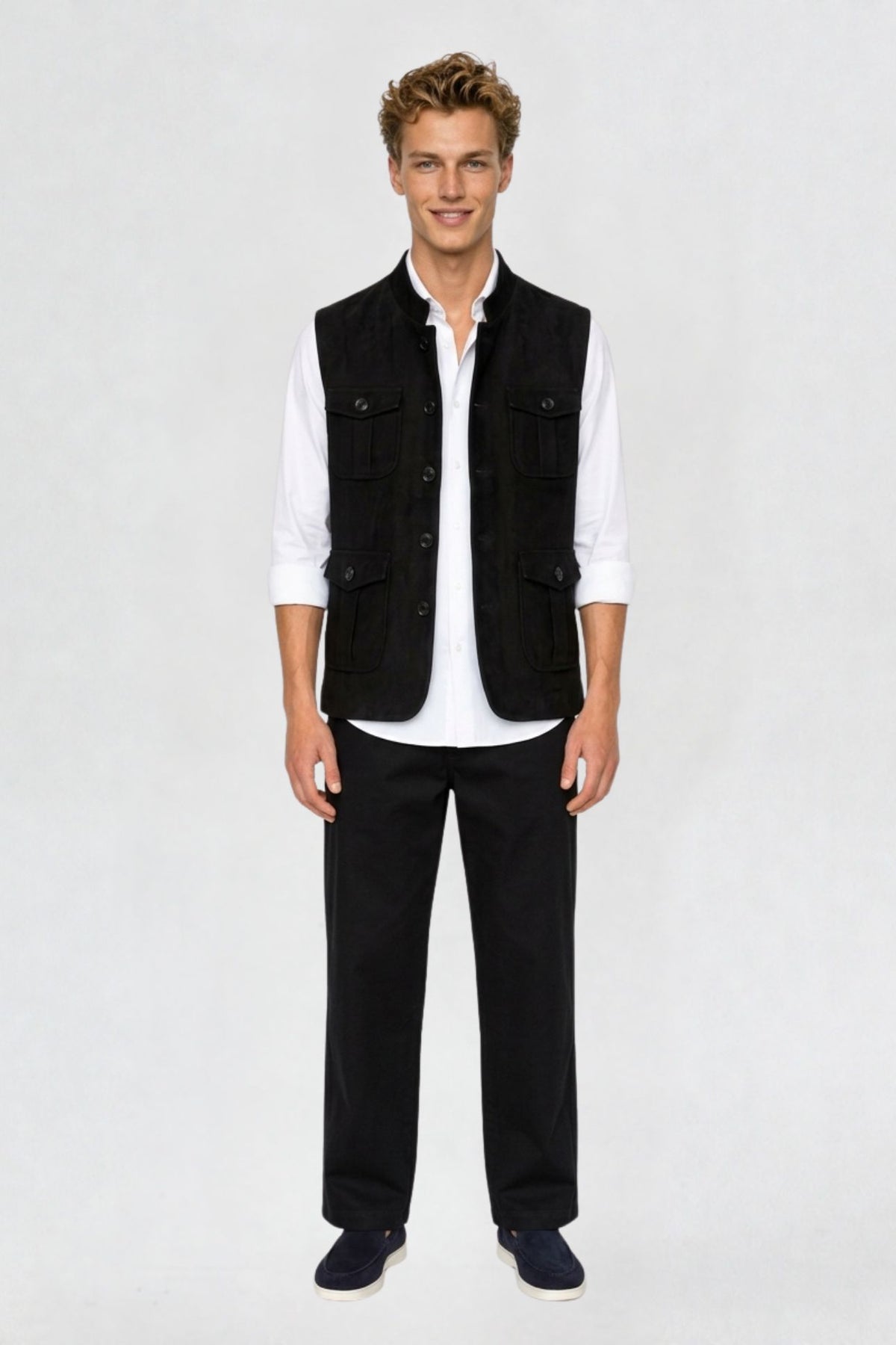 Men's black tweed cargo half sleeve jacket, full front view, four flap pockets and button closure, worn over white shirt and black trousers