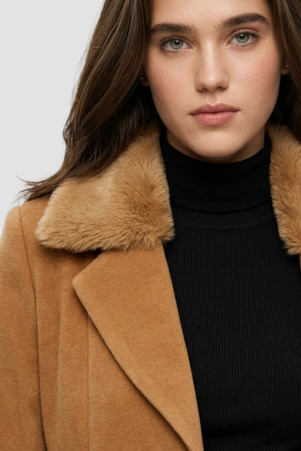 Close-up of camel brown faux fur overcoat showing faux fur collar and notch lapel detail