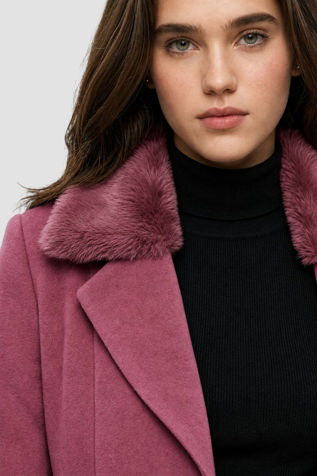 Close-up of pink faux fur overcoat showing faux fur collar and notch lapel detail