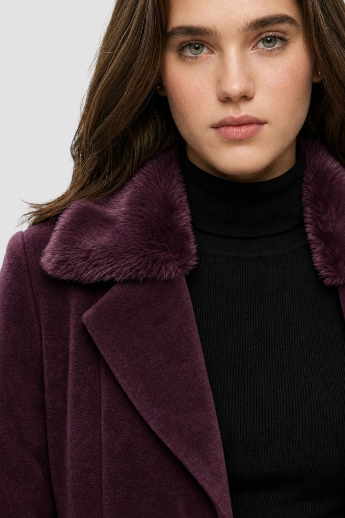 Close-up of wine purple faux fur overcoat showing faux fur collar and notch lapel detail